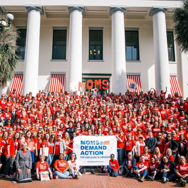 A large crowd of Moms Demand Action volunteers pose for a group photo at Florida's Advocacy Day