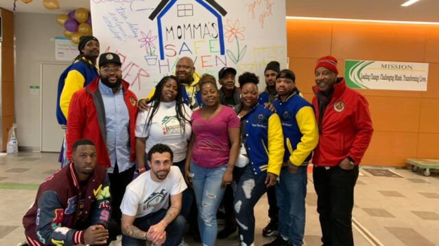 A group of volunteers with Mommas Safe Haven