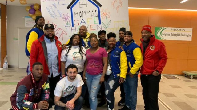 A group of volunteers with Mommas Safe Haven